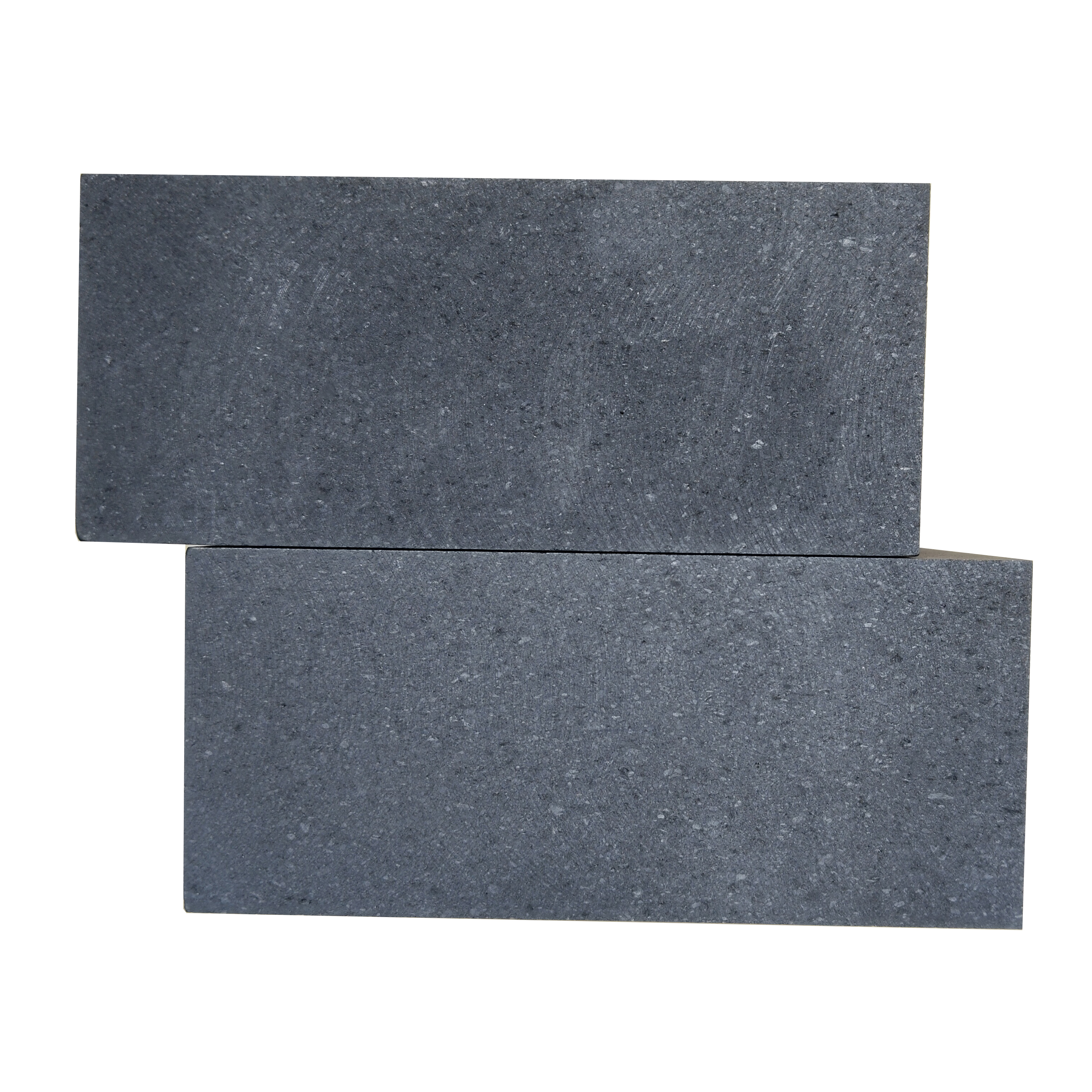 Gros plan de la surface d'un bloc de graphite &agrave; grain moyen montrant une texture naturelle de particules de 0,8 mm et une structure moul&eacute;e par vibration uniforme, densit&eacute; 1,72 g/cm&sup3; pour les applications de moules de coul&eacute;e