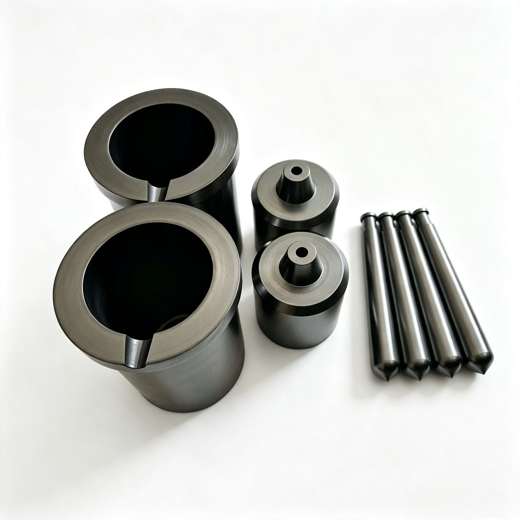 Creusets en graphite avec trous centraux | Tiges/buses de bouchon pour machines de coulée sous vide | Composants de fusion de graphite personnalisés résistant aux hautes températures