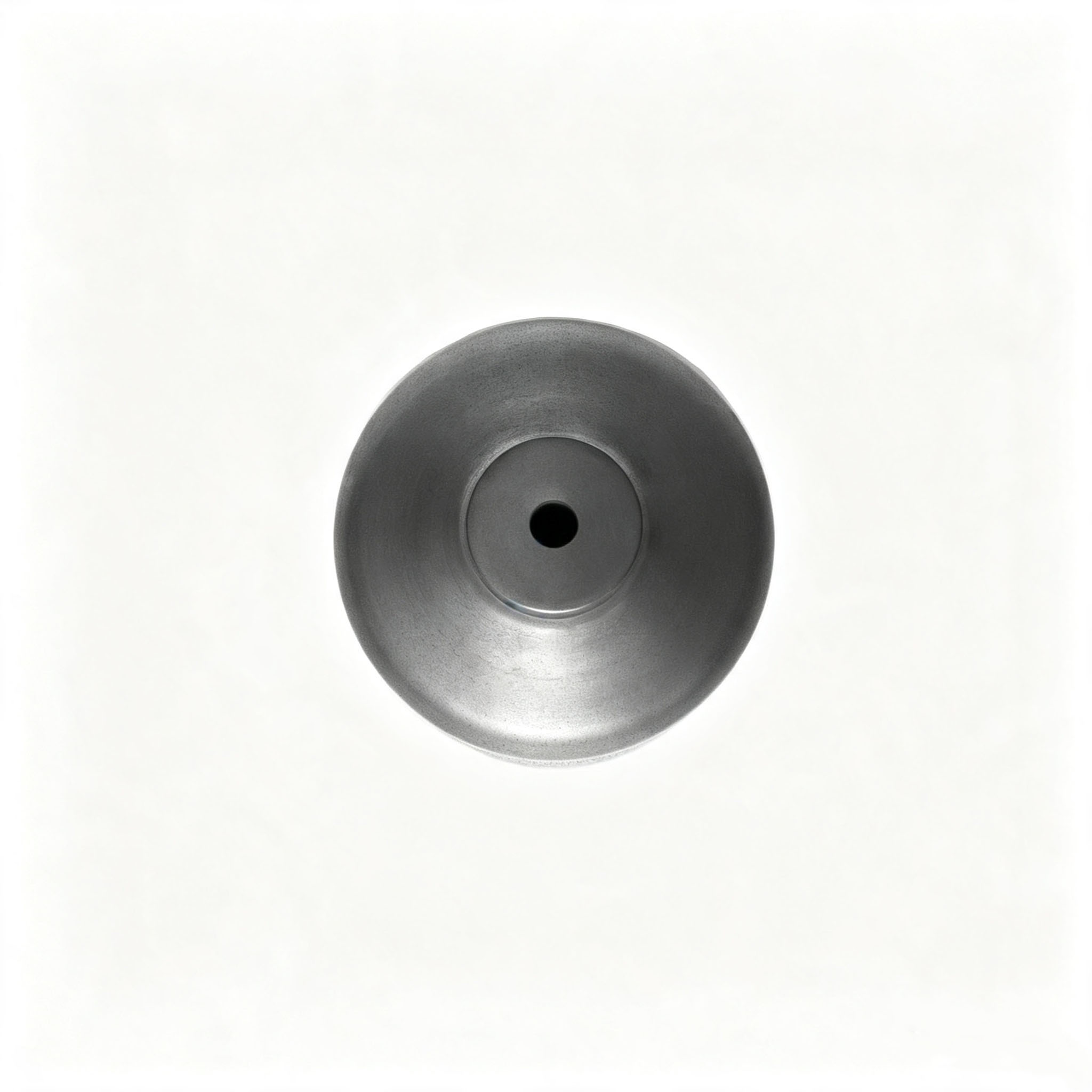 Plan de haut en bas d'un creuset en graphite usin&eacute; avec pr&eacute;cision avec trou de d&eacute;charge central lisse, mat&eacute;riau en graphite isostatique dense pour un versement stable du m&eacute;tal en fusion