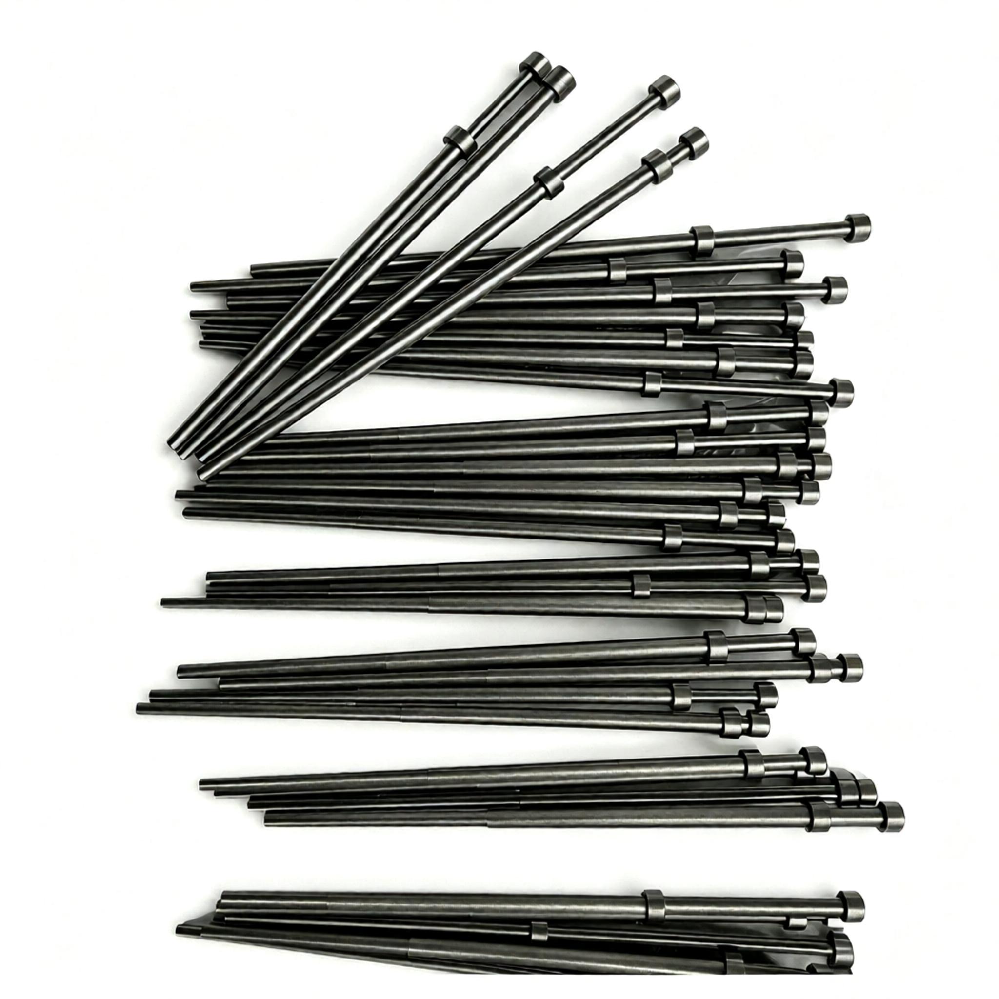 Inventaire de tiges de support en graphite &agrave; double bride en vrac, arbre porteur en graphite &eacute;tag&eacute; personnalis&eacute; pour four de frittage